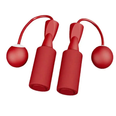 Red cordless skipping rope for fitness training, featuring adjustable handles and weighted balls for effective workouts.