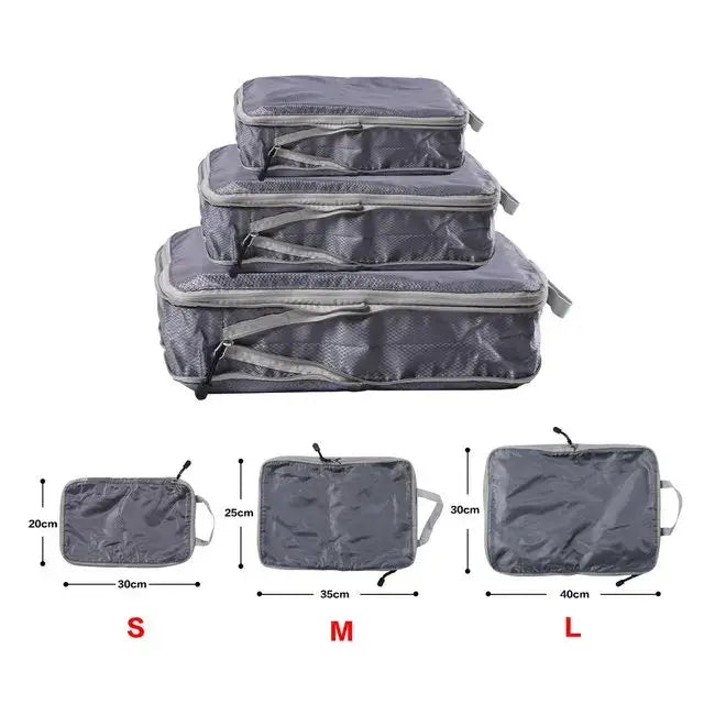 Foldable compressible packing cubes in various sizes for efficient travel storage and organization.