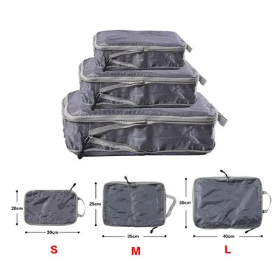 Foldable compressible packing cubes in various sizes for efficient travel storage and organization.