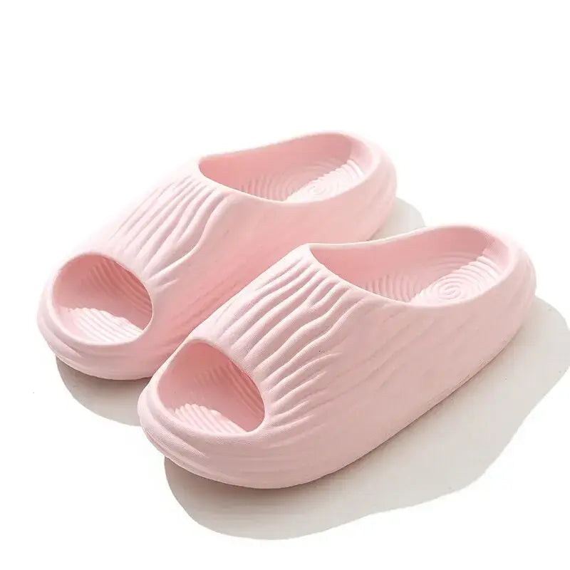 Unisex EVA thick-soled non-slip odor-resistant outdoor slippers for men and women, ideal for home and casual wear.