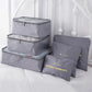 Nevytech 6Pcs Travel Packing Cubes Set organized inside a suitcase for efficient packing.