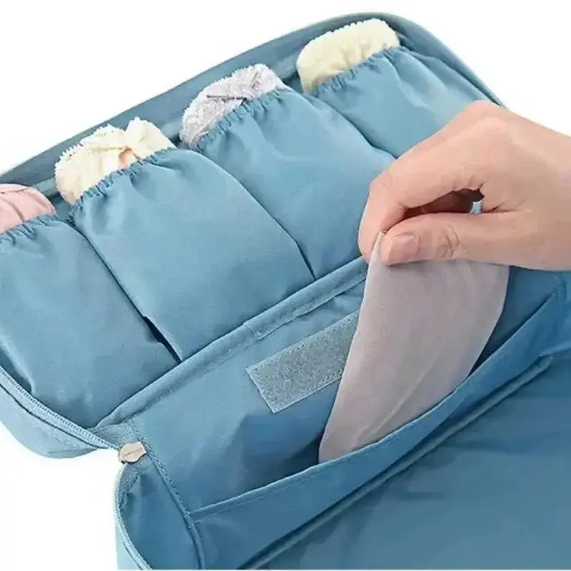 Nevytech 6Pcs Travel Luggage Packing Cubes organized in pink suitcase with laundry pouch and clothing.