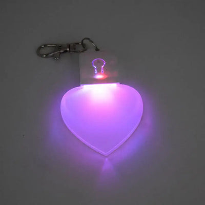 Heart-shaped LED keychain light, purple glowing purse charm, perfect for women and girls.