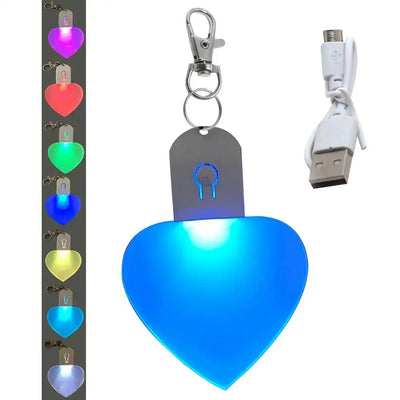 Heart-shaped LED light keychain with USB charger, available in multiple colors for purses and handbags.