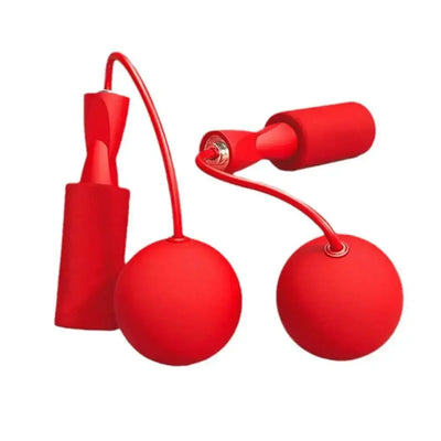 Red cordless skipping rope for fitness training, featuring weighted balls for enhanced workouts.
