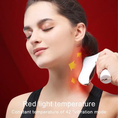 Woman using red light fascial massager on her neck for relaxation and deep muscle relief.