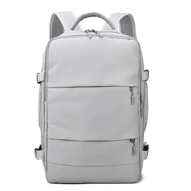 Large capacity waterproof travel backpack for women with anti-theft features and USB charging port in gray.