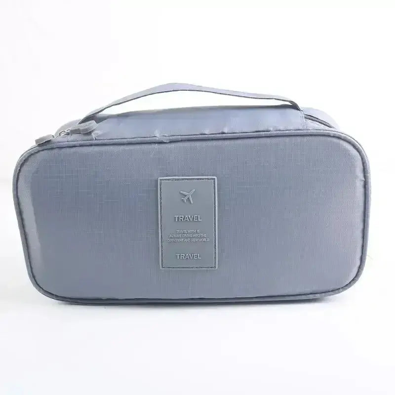 Nevytech 6Pcs Travel Luggage Packing Cubes organized in pink suitcase with laundry pouch and clothing.