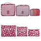 Nevytech 6Pcs Travel Luggage Packing Cubes organized in pink suitcase with laundry pouch and clothing.