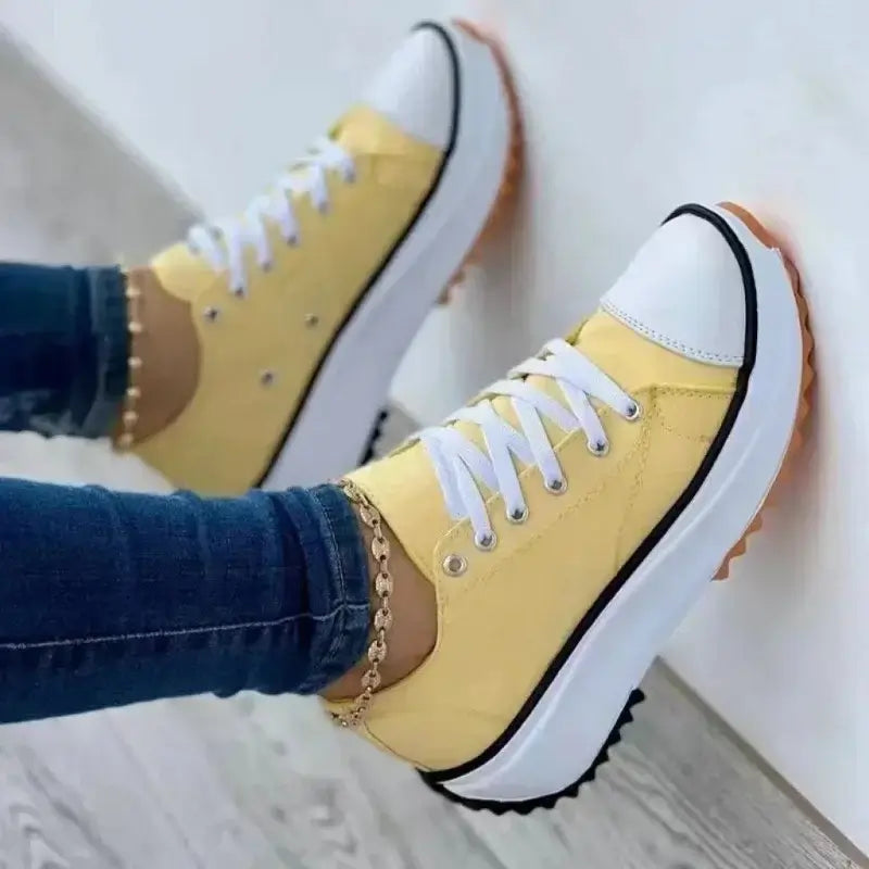 Autumn new women's canvas tennis shoes – breathable high-top casual female footwear with thick soles and lace-up vulcanized design.