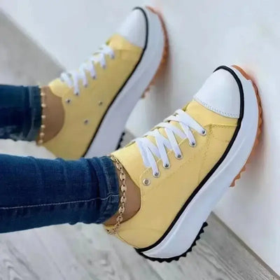 Autumn new women's canvas tennis shoes – breathable high-top casual female footwear with thick soles and lace-up vulcanized design.