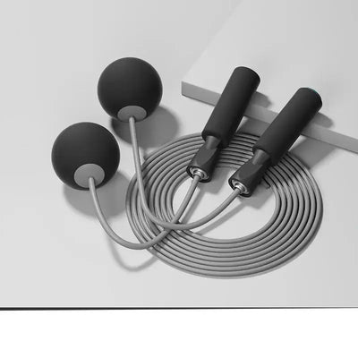 Cordless skipping rope with heavy balls for fitness training and aerobics, featuring PU rope and ergonomic handles.