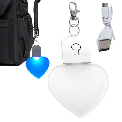LED heart light keychain with USB charger, perfect for handbags or backpacks, ideal for women and girls.