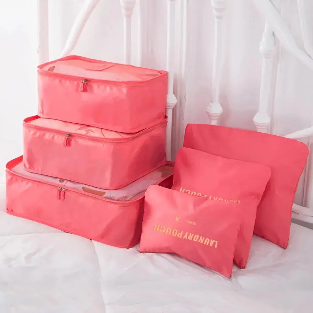 6pcs pink travel packing cubes for organizing shoes, clothes, and accessories in suitcases.