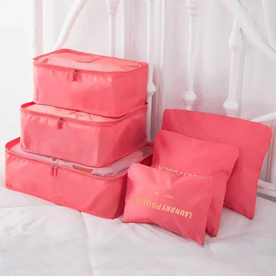 6pcs pink travel packing cubes for organizing shoes, clothes, and accessories in suitcases.