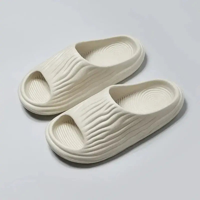 Unisex EVA thick-soled non-slip odor-resistant outdoor slippers for men and women, ideal for home and casual wear.