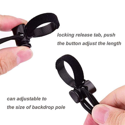 Adjustable photography background clip with release tab for easy length adjustment and secure fit on backdrop poles.