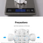 Nevytech Portable water purifier valve weighing 61g on digital scale with precautionary guidelines.