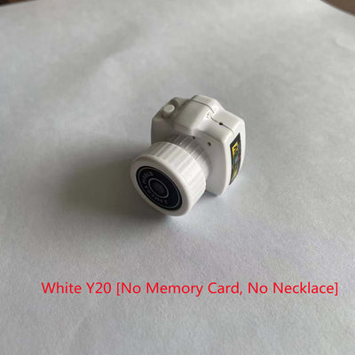 White Y20 mini camera without memory card, compact size, no necklace attachment, ideal for photography.