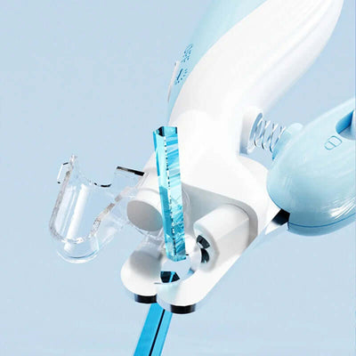 Close-up of an LED electric pet nail clipper with a clear guide and ergonomic design for safe claw trimming.