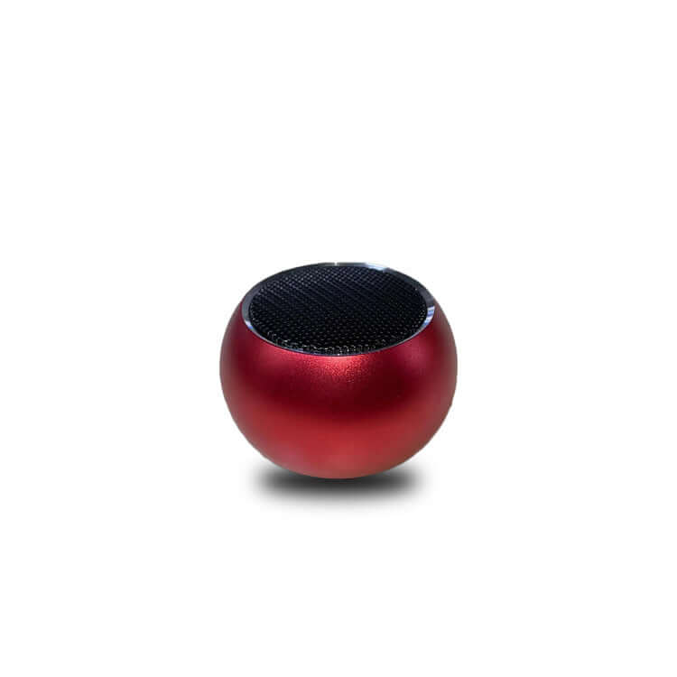 Compact red outdoor Bluetooth speaker with a sleek design, perfect for portable audio on the go.